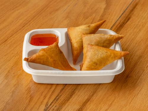 Thai-style samosas with dipping sauce